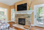 Fire up the gas fireplace or open the doors to the screen porch for cool lake breezes